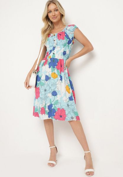 Jasnoniebieska Bawełniana Sukienka o Rozkloszowanym Kroju z Gumką w Talii w Kwiatowy Wzór Rishta. Niebieskie sukienki damskie Born2be, na lato, l, bez wzorów, z bawełny, bez kołnierzyka, bez ramiączek, rozkloszowane. Za 49.99 zł.