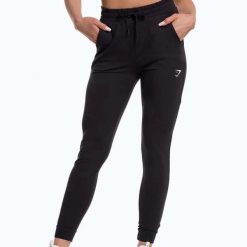 Spodnie treningowe damskie Gymshark Pippa Training. Czarne spodnie dresowe damskie GYMSHARK, bez wzorów, sportowe, na fitness i siłownię. Za 109.99 zł.