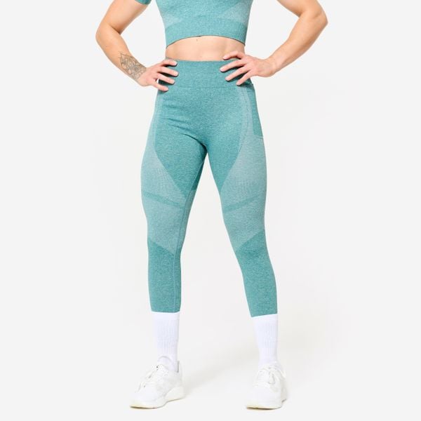 Legginsy fitness damskie Domyos. Zielone legginsy damskie DOMYOS, bez wzorów, z elastanu. W wyprzedaży za 79.99 zł.