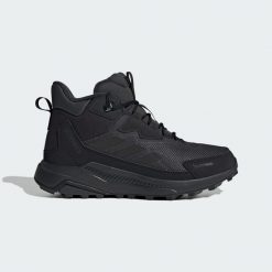 Buty trekkingowe Terrex Anylander CLIMAWARM+. Czarne obuwie trekkingowe damskie Adidas, bez zapięcia. Za 529.00 zł.