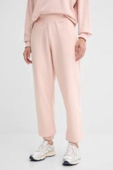 GUESS Różowe dresowe damskie spodnie Primula, Rozmiar M. Czerwone spodnie dresowe damskie Guess, z aplikacjami, z dresówki. W wyprzedaży za 251.99 zł.