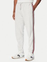 Tommy Hilfiger Spodnie dresowe UM0UM03944 Szary jasny Regular Fit. Szare spodnie sportowe męskie Tommy Hilfiger, m, bez wzorów, z bawełny. Za 369.99 zł.