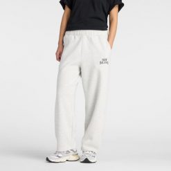 Spodnie damskie New Balance WB61W1DZAHH – szare. Szare spodnie dresowe damskie New Balance, bez wzorów, z bawełny, klasyczne. Za 279.99 zł.