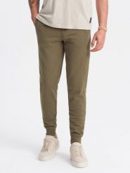 Męskie bawełniane spodnie dresowe joggery BASIC – oliwkowe V2 OM-PABS-0174 - XXL. Zielone spodnie sportowe męskie Ombre Clothing, l, bez wzorów, z bawełny. Za 119.99 zł.