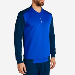 Bluza piłkarska dla dorosłych Kipsta T100. Niebieskie bluzy damskie KIPSTA, xl, bez wzorów, z elastanu, eleganckie, bez ramiączek, bez kaptura. Za 69.99 zł.