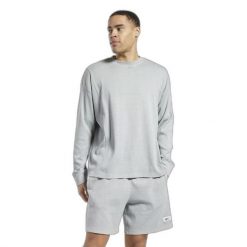 Bluza z dekoltem w kolorze naturalnym Reebok Classics. Szare bluzy męskie Reebok, s, bez wzorów, sportowe, bez ramiączek, bez kaptura. W wyprzedaży za 226.20 zł.