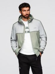 Męska kontrastowa kurtka wiatrówka z kapturem - oliwkowo-szara V3 - Rozmiar: S. Szare kurtki sportowe męskie Ombre Clothing, m, z aplikacjami, z gumy, z kapturem. Za 299.99 zł.