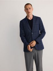 Marynarka slim fit w kratę - granatowy. Niebieskie garnitury męskie Reserved, bez wzorów, z tkaniny. Za 359.99 zł.