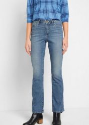 Jeansy o kroju bootcut ze średnim stanem, z bawełny organicznej. Niebieskie jeansy damskie bonprix, bez wzorów, z bawełny. Za 147.99 zł.