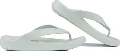 Crocs Japonki klapki damskie Crocs Getaway Flip zielone 209589 3VS 39-40. Zielone klapki damskie Crocs, bez wzorów, sportowe, bez obcasa, bez zapięcia. Za 182.74 zł.