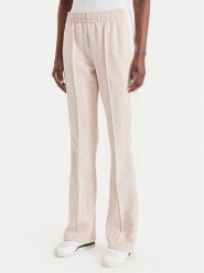 Lacoste Spodnie dresowe XF9313 Różowy jasny Regular Fit. Czerwone spodnie dresowe damskie Lacoste, bez wzorów, z dresówki. Za 769.99 zł.