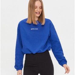 Bluza z napisem - Niebieski. Niebieskie bluzy damskie House, l, bez wzorów, bez ramiączek, bez kaptura. Za 69.99 zł.