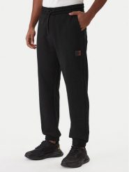 HUGO Spodnie dresowe Danopan 50553146 Czarny Relaxed Fit. Czarne spodnie sportowe męskie Hugo, l, bez wzorów, z bawełny. Za 549.99 zł.