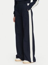 Guess Spodnie materiałowe V6YB26 K5139 Granatowy Relaxed Fit. Niebieskie spodnie dresowe damskie Guess, z aplikacjami, z bawełny. Za 434.99 zł.