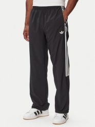 Adidas Spodnie dresowe Care Bears KR1480 Czarny Oversize. Czarne spodnie sportowe męskie Adidas, m, bez wzorów, z dresówki. Za 278.99 zł.