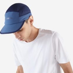 Czapka z daszkiem do biegania Kiprun 5 paneli. Niebieskie czapki damskie KIPRUN, bez wzorów, z materiału, sportowe. Za 49.99 zł.