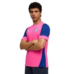 Treningowa koszulka Manchester City. Czerwone bluzki damskie Puma, bez wzorów, sportowe, bez kołnierzyka, bez ramiączek. Za 238.95 zł.