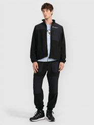 4F Spodnie polarowe joggery męskie - czarne L. Czarne spodnie materiałowe męskie 4F, bez wzorów, z dresówki. Za 159.99 zł.