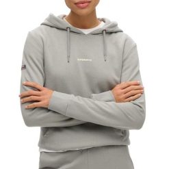 Jednokolorowa bluza z kapturem damska Superdry. Niebieskie bluzy damskie Superdry, xl, bez wzorów, z bawełny, klasyczne, bez ramiączek, z kapturem. Za 318.75 zł.