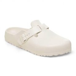 Klapki damskie Birkenstock Boston Eva Eggshell. Białe klapki damskie Birkenstock, bez wzorów, z materiału, bez obcasa, bez zapięcia. Za 392.00 zł.