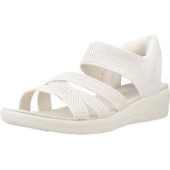 Sandały SKECHERS SLIP-INS ARYA Biały. Białe sandały damskie Skechers, bez wzorów, z materiału, bez obcasa, bez zapięcia. Za 490.00 zł.