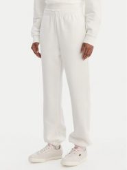 Lacoste Spodnie dresowe XF5244 Écru Regular Fit. Spodnie dresowe damskie Lacoste, bez wzorów, z dresówki. Za 639.99 zł.