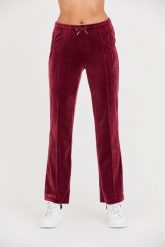 JUICY COUTURE Bordowe spodnie dresowe Tina Track Pants. Czerwone spodnie dresowe damskie Juicy Couture, bez wzorów, z dresówki. W wyprzedaży za 291.99 zł.