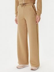 Guess Spodnie dresowe V5YB19 KBSL2 Beżowy Regular Fit. Brązowe spodnie dresowe damskie Guess, z aplikacjami, z dresówki. Za 239.99 zł.