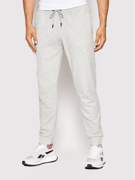 Guess Spodnie dresowe Z2YB22 KAIJ1 Szary Regular Fit. Szare spodnie sportowe męskie Guess, m, z aplikacjami, z bawełny. Za 329.99 zł.