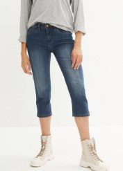 Jeansy slim fit, cropped, średni stan. Niebieskie jeansy damskie bonprix, bez wzorów, z jeansu. Za 94.99 zł.