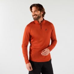 Bluza tenisowa termoaktywna męska Thermic na krótki suwak. Brązowe bluzy męskie ARTENGO, m, bez wzorów, z elastanu, sportowe, bez ramiączek, bez kaptura. Za 89.99 zł.