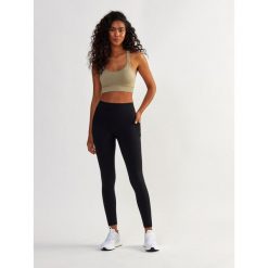 Legginsy fitness damskie Beshaped Lift Me Up z kieszeniami. Szare legginsy damskie BESHAPED, bez wzorów, z nylonu. W wyprzedaży za 169.15 zł.