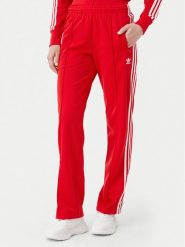 Adidas Spodnie dresowe adicolor Classics Firebird IR8081 Czerwony Regular Fit. Czerwone spodnie dresowe damskie Adidas, bez wzorów, z dresówki. Za 219.99 zł.