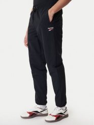 Reebok Spodnie dresowe Barrett RK25552CCM Czarny Regular Fit. Czarne spodnie sportowe męskie Reebok, m, bez wzorów, z dresówki. Za 299.99 zł.