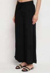 Czarne Wiskozowe Spodnie o Szerokim Kroju Ozdobione Sznurkiem Natamia. Czarne spodnie materiałowe damskie Born2be, bez wzorów, z jeansu, eleganckie. Za 59.99 zł.