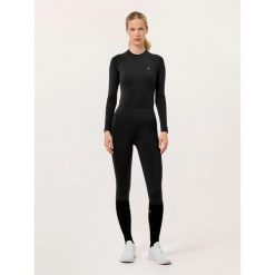 Damskie legginsy jeździeckie z pełną przyczepnością Equestrian Stockholm Jump Mo. Czarne legginsy damskie EQUESTRIAN STOCKHOLM, bez wzorów. Za 455.35 zł.