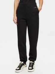 Calvin Klein Spodnie dresowe K20K208330 Czarny Relaxed Fit. Czarne spodnie dresowe damskie Calvin Klein, bez wzorów, z bawełny. Za 239.99 zł.