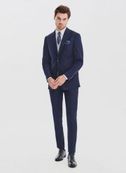 PAKO LORENTE - Granatowy garnitur męski z wełną. Niebieskie garnitury męskie Pako Lorente, m, bez wzorów, z poliesteru, biznesowe. Za 1,739.98 zł.