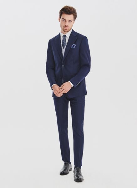 PAKO LORENTE - Granatowy garnitur męski z wełną. Niebieskie garnitury męskie Pako Lorente, m, bez wzorów, z poliesteru, biznesowe. Za 1,739.98 zł.