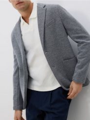 Dzianinowa marynarka slim fit - granatowy. Niebieskie garnitury męskie Reserved, l, bez wzorów, z bawełny. W wyprzedaży za 119.99 zł.