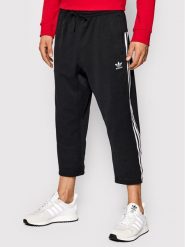 Adidas Spodnie dresowe adicolor Classics H09121 Czarny Relaxed Fit. Czarne spodnie sportowe męskie Adidas, m, bez wzorów, z bawełny. Za 179.99 zł.