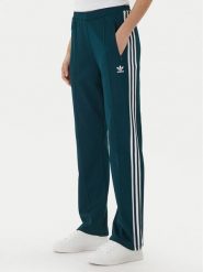 Adidas Spodnie dresowe Beckenbauer JV7395 Zielony Regular Fit. Zielone spodnie dresowe damskie Adidas, bez wzorów, z dresówki. Za 239.99 zł.