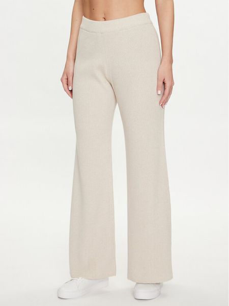 Pangaia Spodnie dzianinowe Recycled Cashmere Beżowy Regular Fit. Brązowe spodnie materiałowe damskie Pangaia, bez wzorów, z dzianiny. Za 569.00 zł.