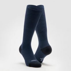 Skarpetki do biegania Kiprun Run 900 wysokie z wełny merynosa. Niebieskie skarpetki damskie KIPRUN, bez wzorów, z elastanu. Za 29.99 zł.
