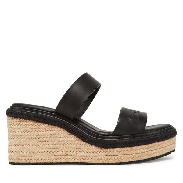 Klapki Calvin Klein. Czarne klapki damskie Calvin Klein, bez wzorów, bez obcasa, bez zapięcia. Za 249.99 zł.