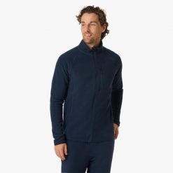 Bluza Polarowa Rozpinana turystyka męska Swedemount Geilo Fleece Full Zip II. Niebieskie bluzy sportowe męskie SWEDEMOUNT, m, bez wzorów, z polaru, bez kaptura, narciarskie. W wyprzedaży za 116.99 zł.