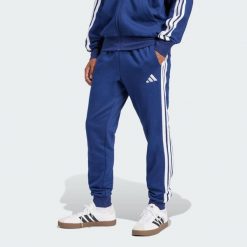 Spodnie Essentials 3-Stripes Fleece. Białe buty sportowe męskie Adidas, bez wzorów, z materiału, na fitness i siłownię. Za 171.99 zł.