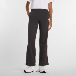 Spodnie damskie New Balance WB61Q2R4ABR – szare. Szare spodnie dresowe damskie New Balance, bez wzorów, z dresówki, klasyczne. Za 279.99 zł.