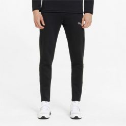 Spodnie męskie Puma EVOSTRIPE. Czarne spodnie sportowe męskie Puma, m, bez wzorów, z dresówki, do piłki nożnej. Za 281.99 zł.