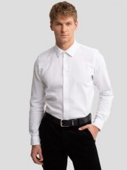 Koszula męska bawełniana biała Menes 101. Białe koszule męskie BIG STAR, l, bez wzorów, z bawełny, eleganckie, bez kołnierzyka, bez ramiączek. W wyprzedaży za 159.99 zł.